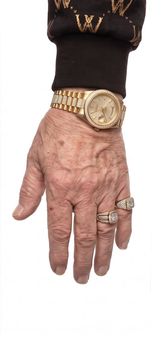 Gold watch and diamond rings